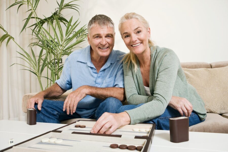 Couple playing backgammon